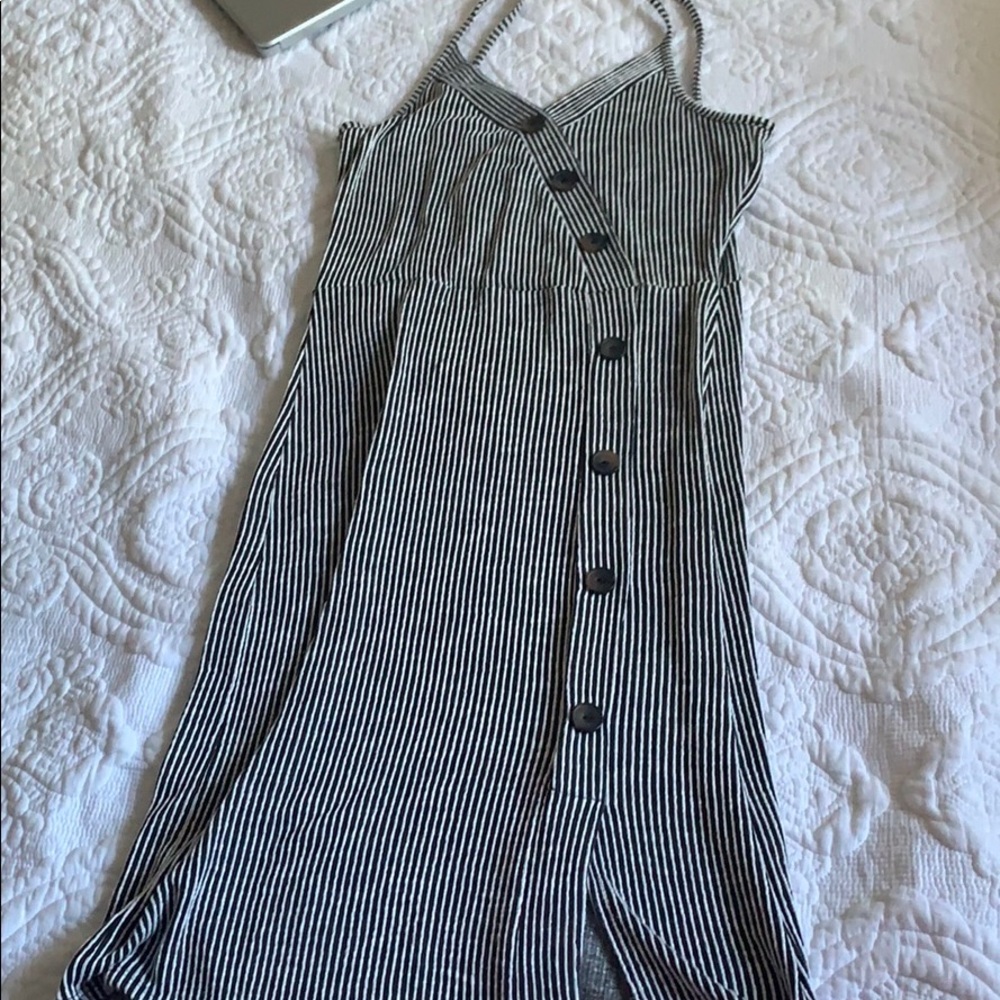 Dress bought and does not fit. Washed once.